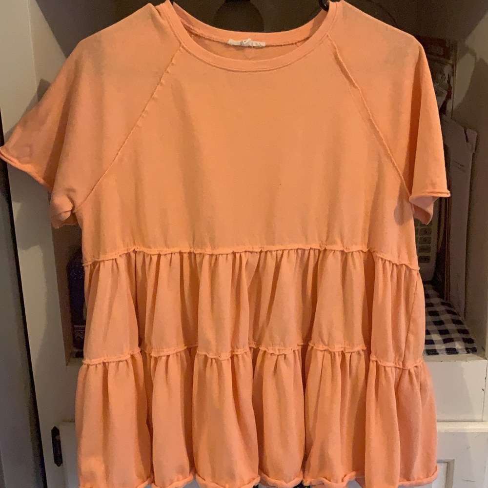 Pink peplum top